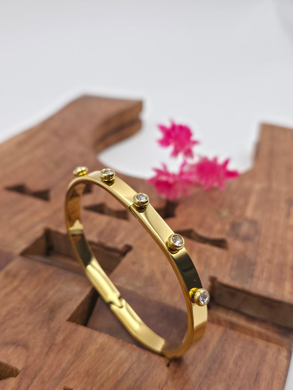 Gold-tone bangle bracelet Kada