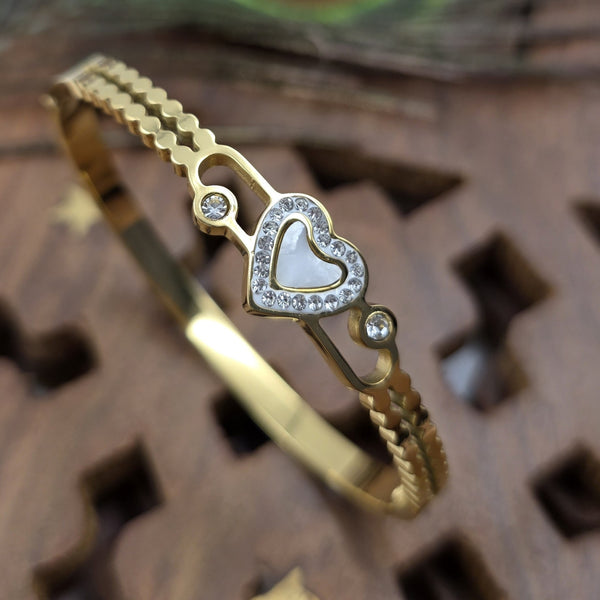 Gold-toned bangle bracelet.