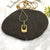 gold-toned pendant necklace