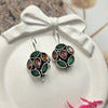 Dangle green stones earrings