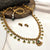 Antique gold-finish necklace and matching stud earrings set,