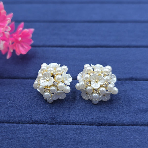 delicate flower-shaped stud earrings