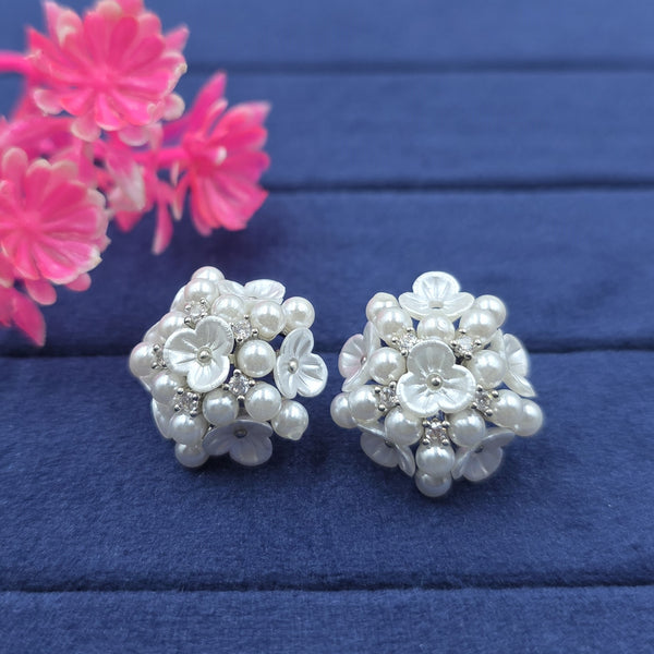 delicate flower-shaped stud earrings
