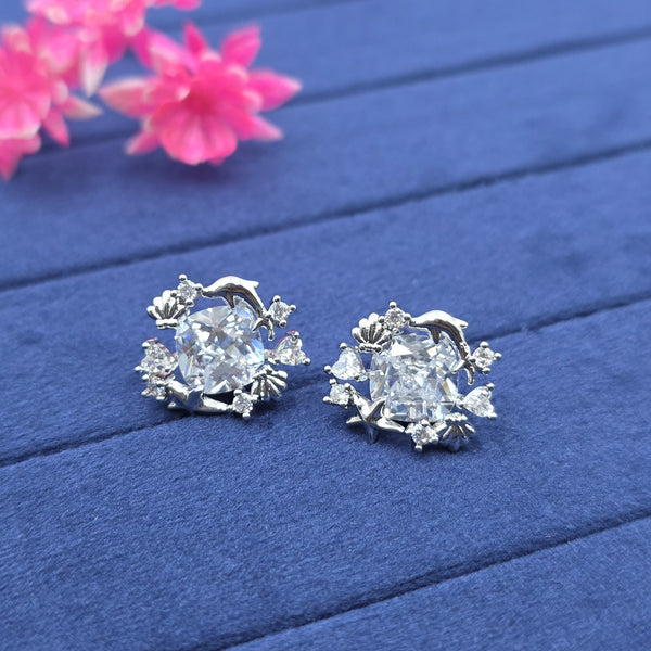 gold-toned stud earrings