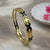 gold-toned bangle bracelet