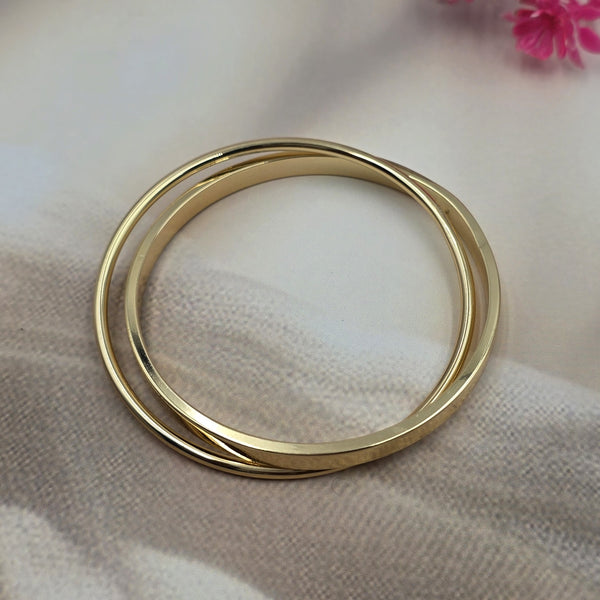 polished gold-tone metal bangle bracelet