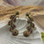 oxidized or antique-finish gold-tone ear cuffs/