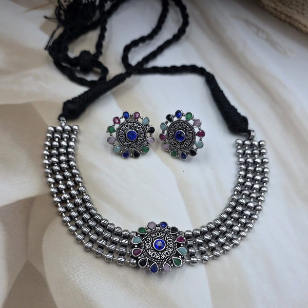 choker necklace and earring set.