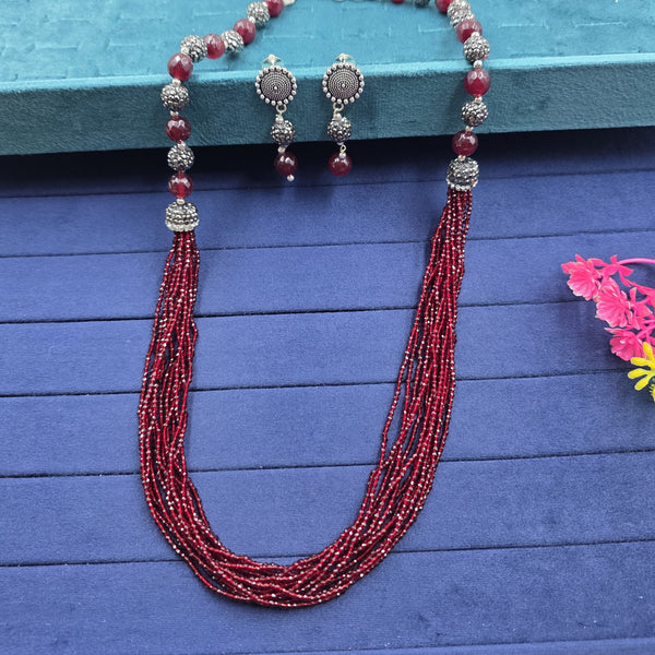 beaded necklace and matching earring set.