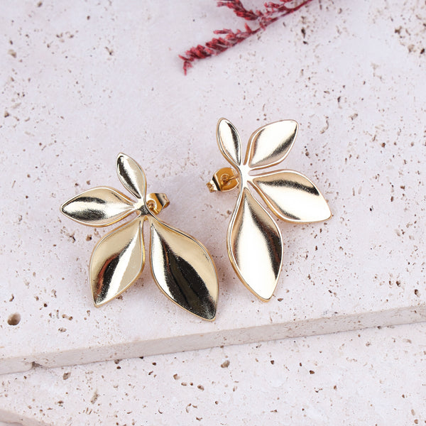 gold and silver leaf earrings