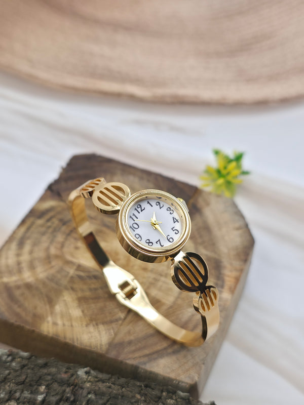 ladies' gold-tone bangle watch