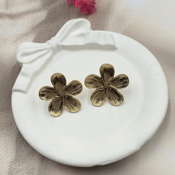Gold-toned floral stud earrings.