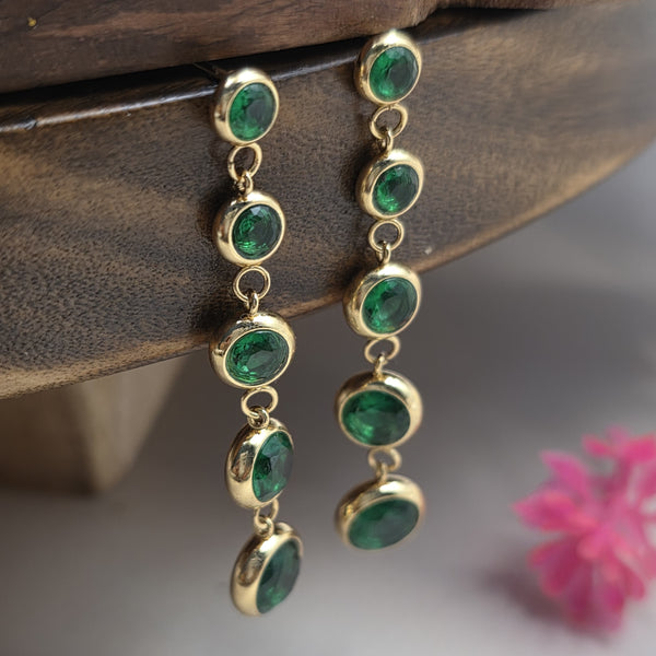 Long dangle or drop earrings.