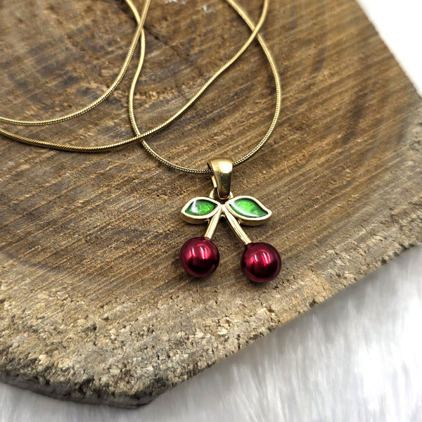 cherry-themed pendant.