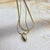pendant layered gold-tone necklace