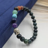 beaded stretch bracelet Buddha head charm