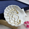 geometric, wire-frame construction. open-cuff bracelet