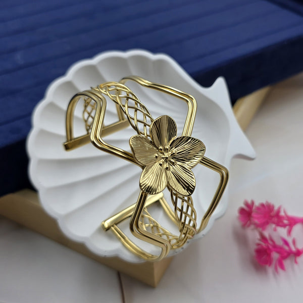 beautiful, ornate gold-toned cuff bracelet!