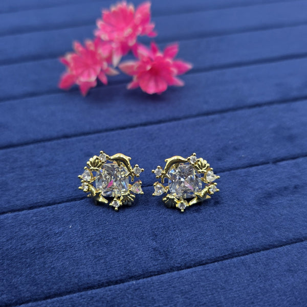 gold-toned stud earrings
