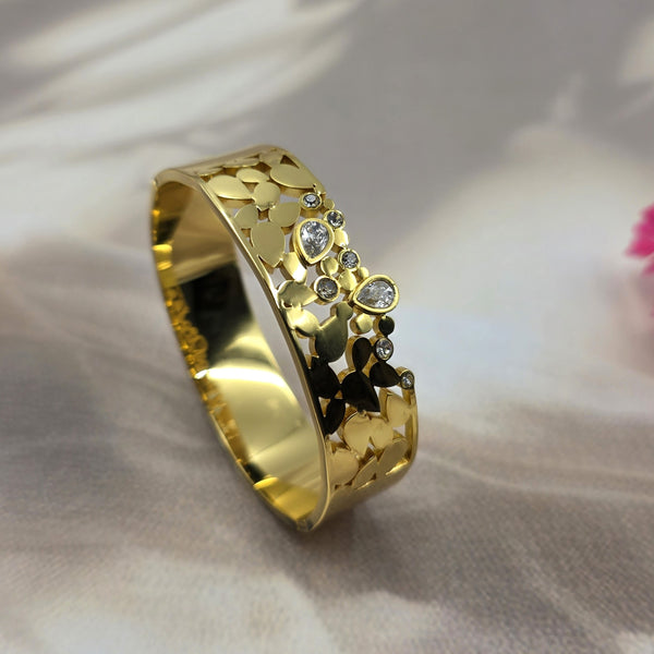 Wide gold cuff bracelet or bangle