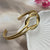 Knot Cuff Bracelet Gold-tone metal bracelet