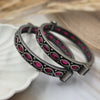 oxidized silver finish deep magenta or ruby-red