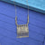 antique gold-tone or oxidized brass/metal necklace