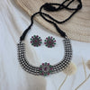 choker necklace and earring set.